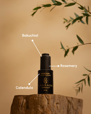 Night Bakuchiol Serum bottle on wood with labeled ingredients Bakuchiol, Rosemary, and Calendula.