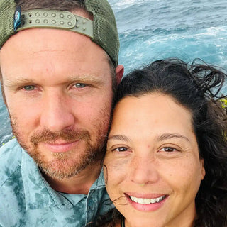 Brent and Adriana at La Perouse Bay, Maui with the ocean in the background 