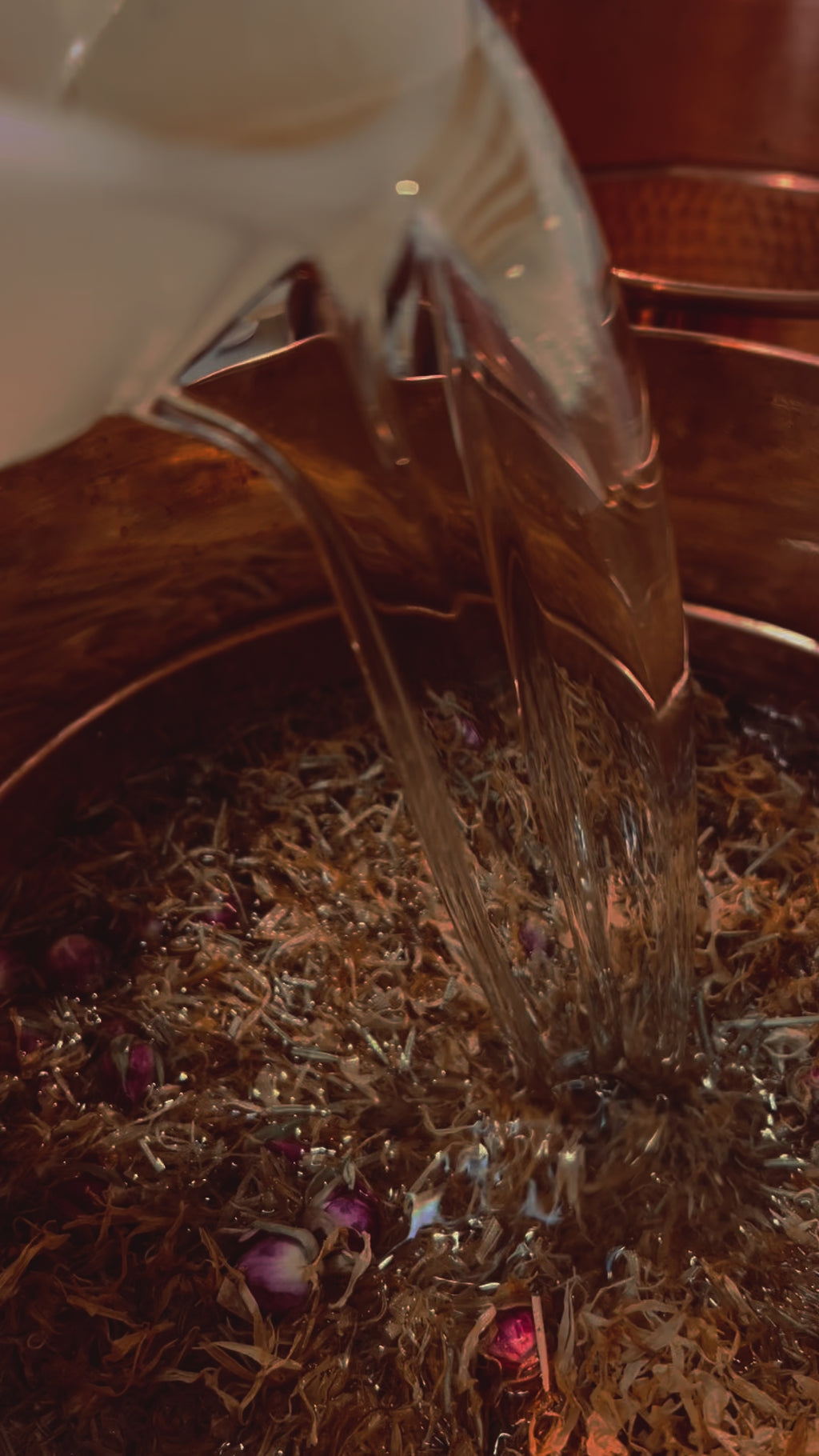 video of the Serum being infused with botanicals