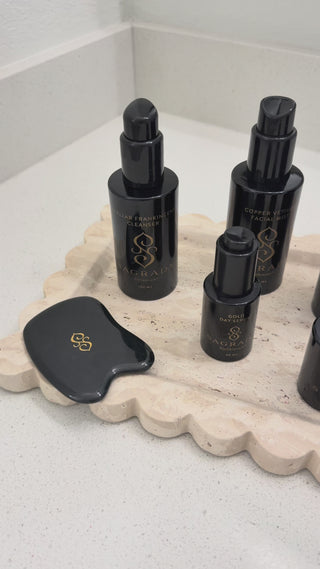 User-generated video introducing the Sagrada Complete Reawakening Skincare System, showing all products in the ritual while the creator talks about their experience, why they enjoy using the system, and how it fits into a simple daily skincare rout