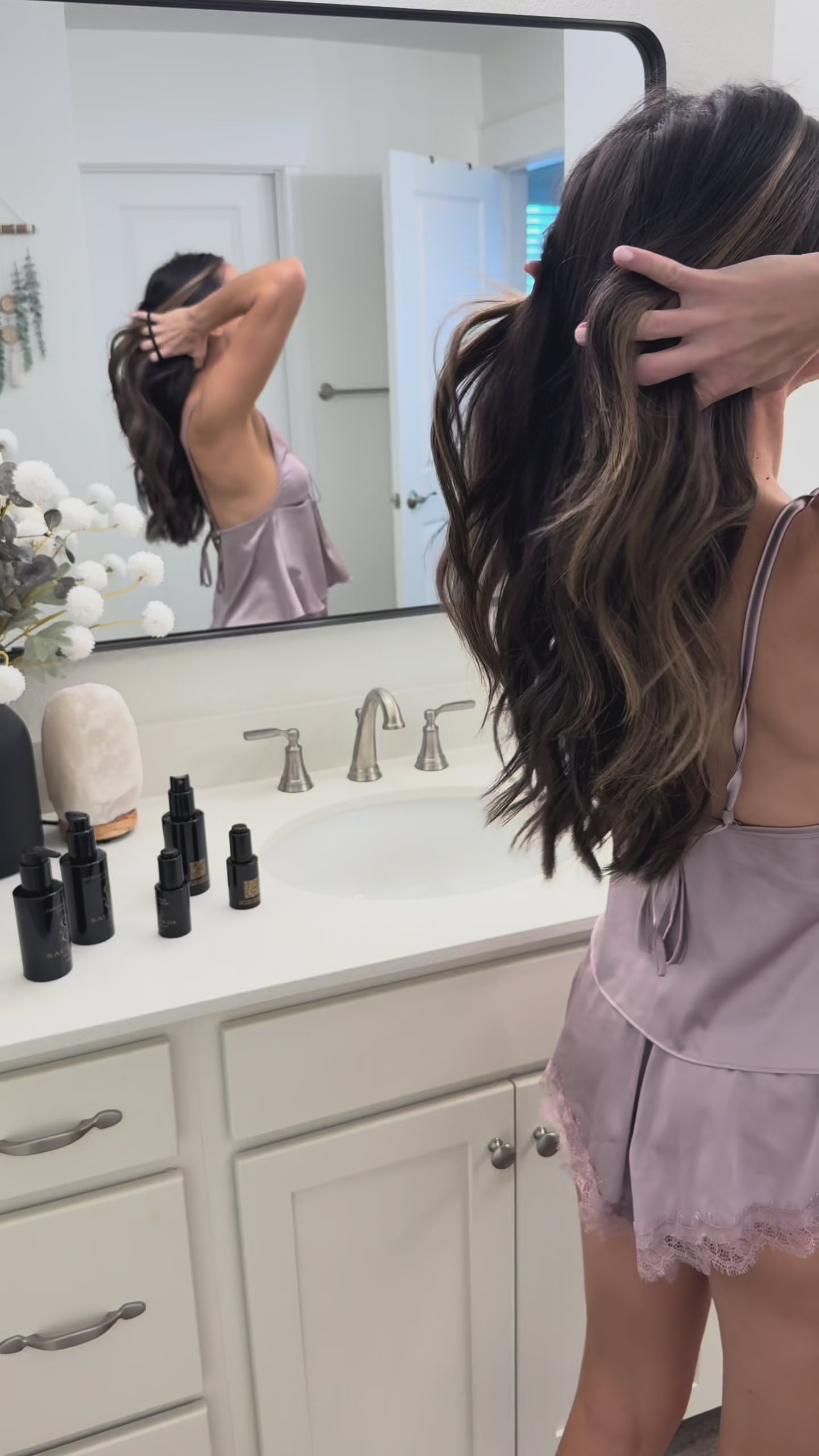 Woman sharing her skincare routine using the Sagrada Complete Reawakening Skincare System as part of a 5-minute botanical ritual