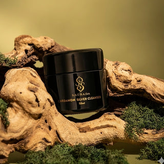 Sagrada Cardamom Silver Cleanser displayed on moss and driftwood, capturing the earthy, botanical essence of the cleanser collection