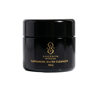 Sagrada Cardamom Silver Cleanser in black glass jar with gold logo, shown in a minimalist product shot on a white background